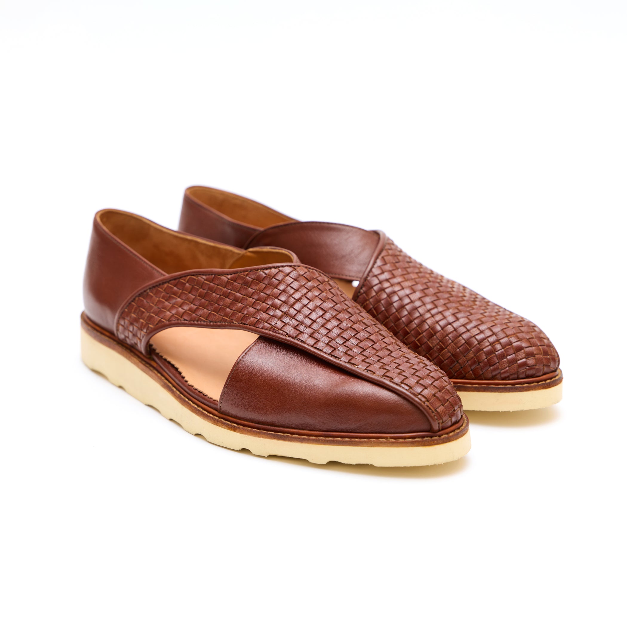 Brown leather Italian dress sandals with woven detailing. 