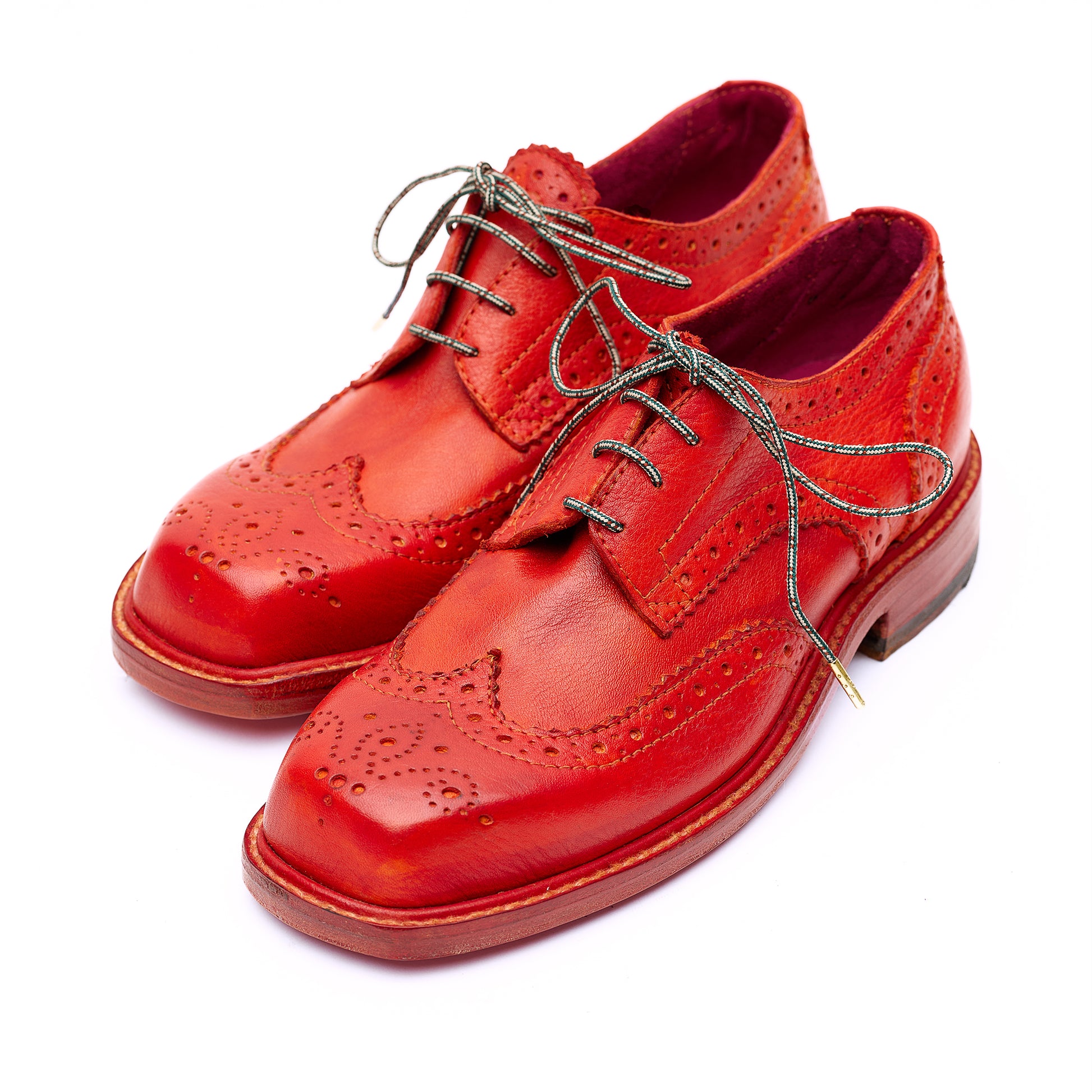 Bright red brogue leather Derby shoes with square toe. 
