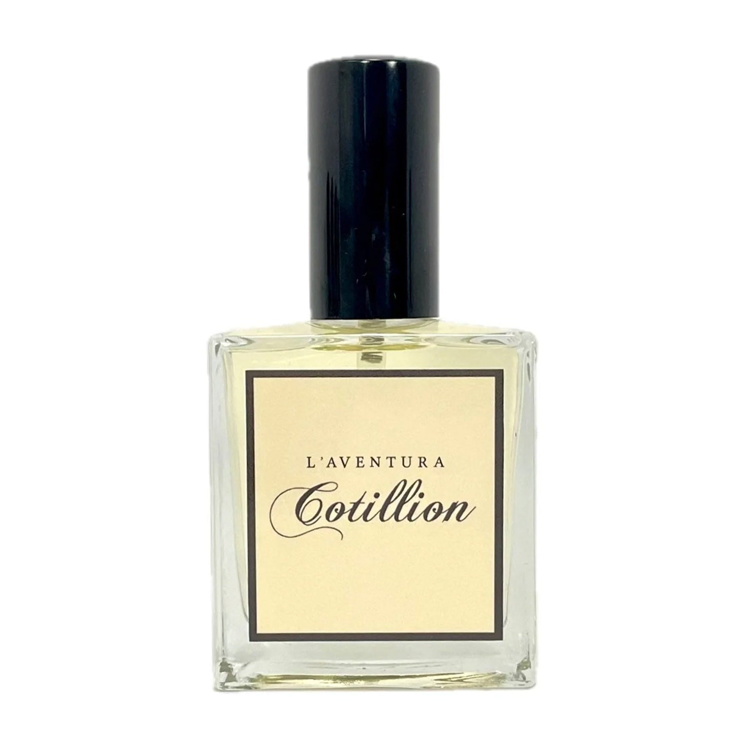 Bottle of L'Aventura "Cotillion" perfume against white background. 