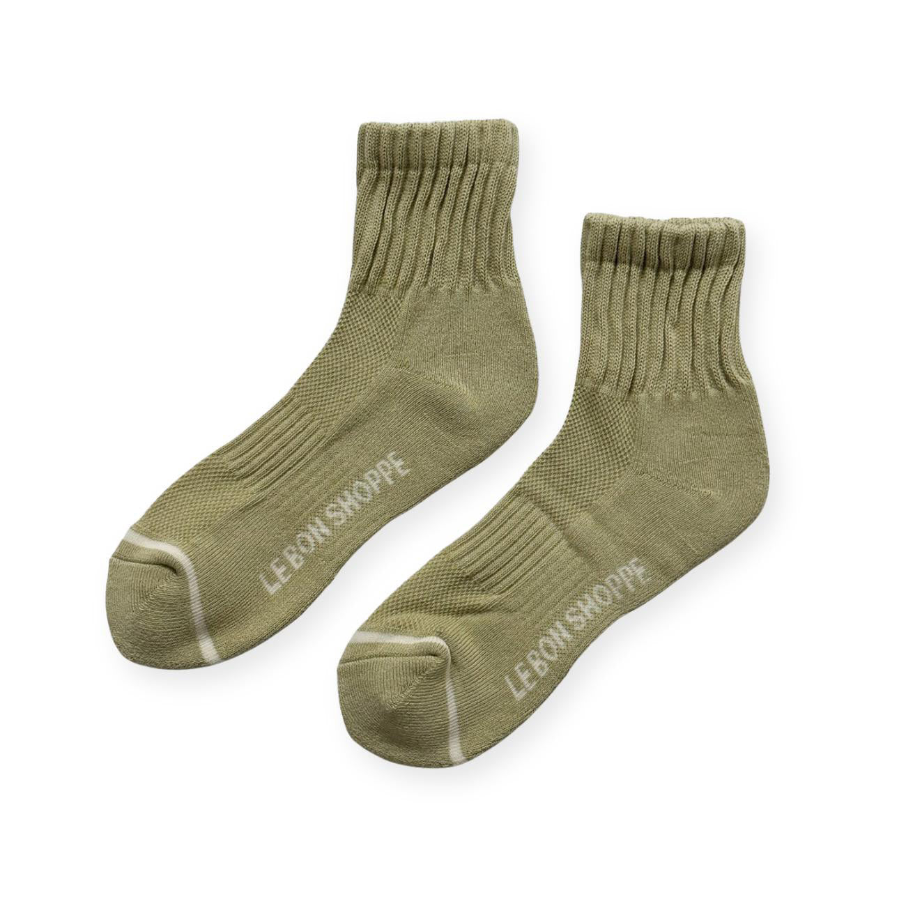 Pair or sage green crew cut socks with Le Bon Shoppe in white on soul. 