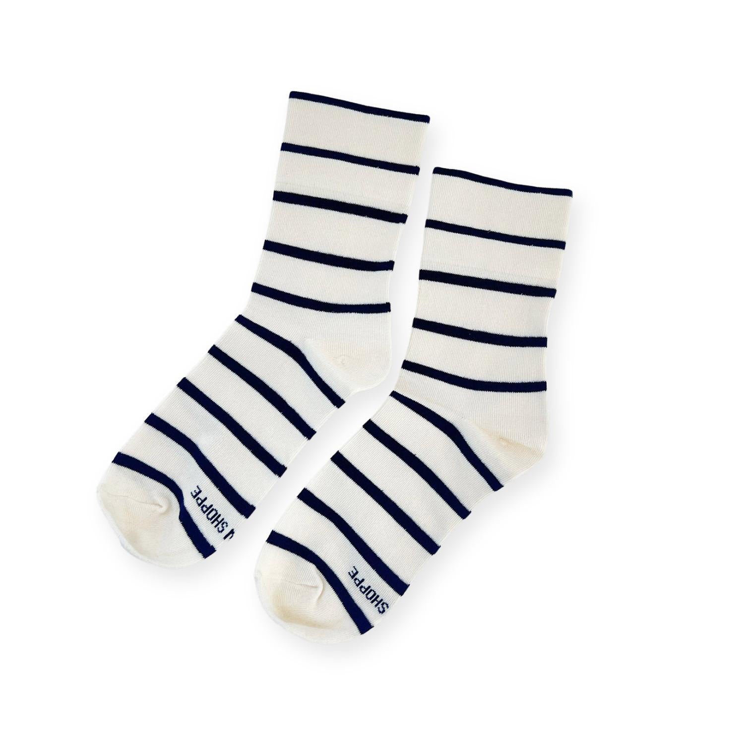 Pair of white breton stripe socks with Shoppe print on toe. 