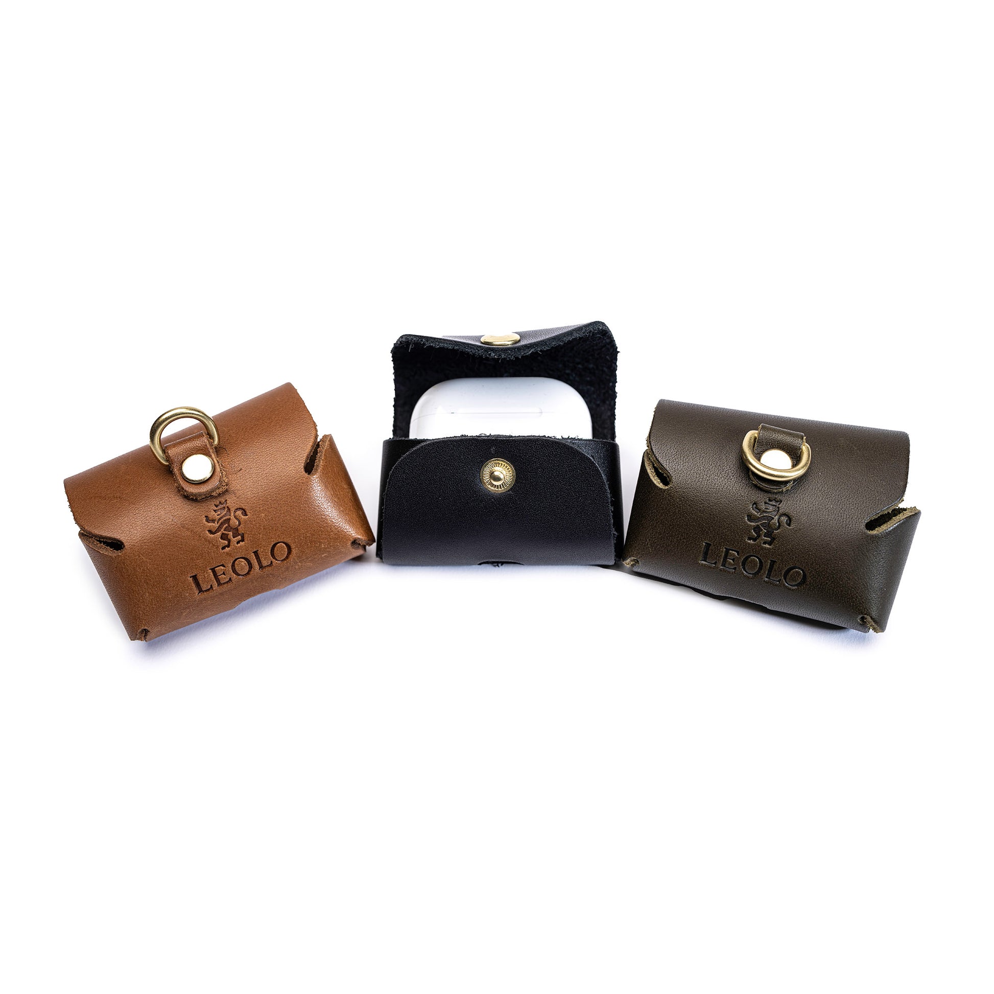 Three Leolo leather ipod cases on white background, cognac and brown with back view showing Leolo logo imprint and D ring, black showing front snap closure. 