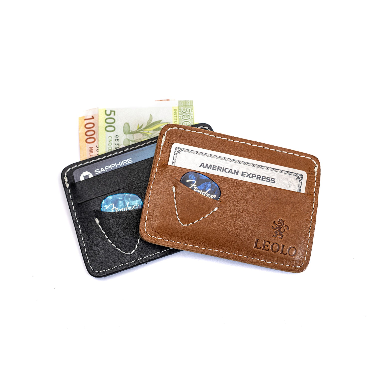 Two Leolo Pickers wallets, minimal leather wallets with spot for guitar pick. Black and brown wallet against white background. 