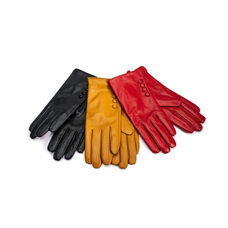 Three pairs of leather gloves in black, yellow and red on white background. 
